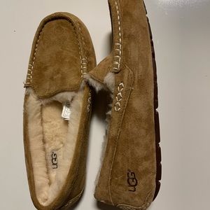 Ugg moccasin slippers. Tan suede with cream shearling inside.